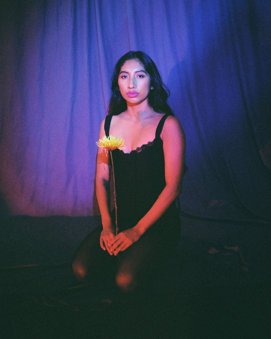 Black corset top with lace trim and ribbon ties, handcrafted in cotton by Mariana by Alba